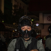 Officer Teary Eyed from Tear Gas