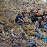 Group of traffickers relaxing 