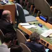 Laurent Fabius sitting in the general assembly at the UN