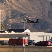 Helibucket lands to refuel