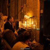 Lighting a Hanukkah in the streets of Jerusalem